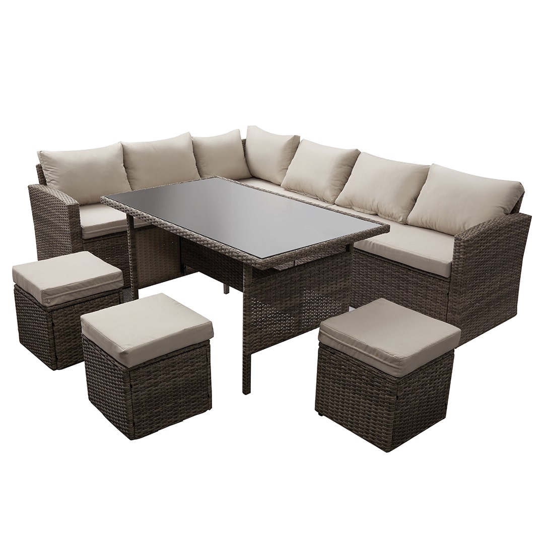 grey rattan dining set with four chairs and a table