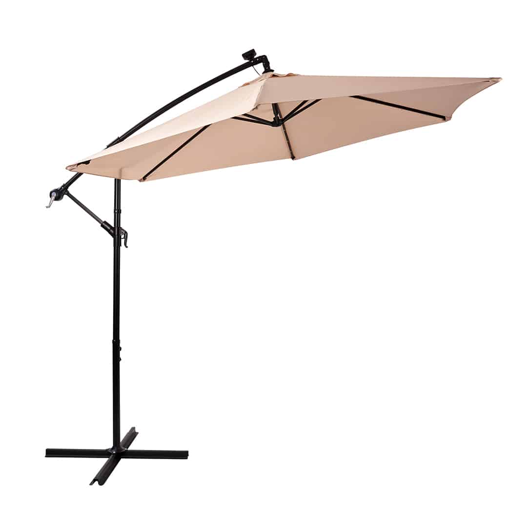 Cream-coloured umbrella with a cantilever stand for patio furniture